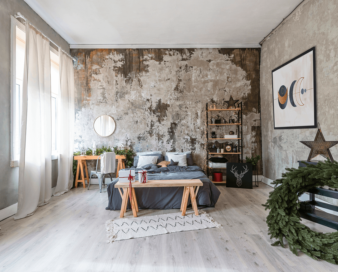 diseno de interiores con marcos de fotos y cama