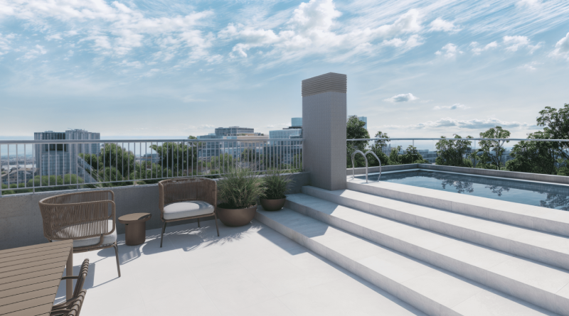 Terrassa comunitària amb piscina i zona de descans en promoció residencial amb vistes urbanes