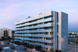 Contemporary housing block with linear façade and common areas
