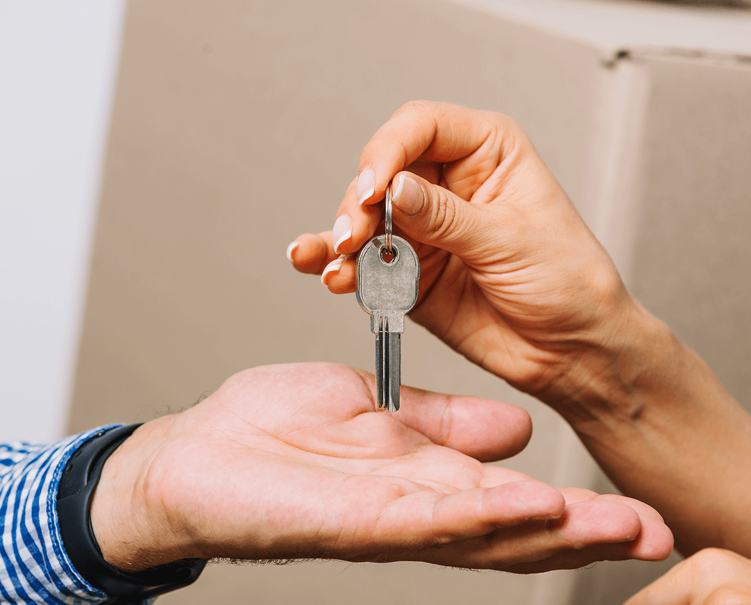 crop people exchanging with keys 1