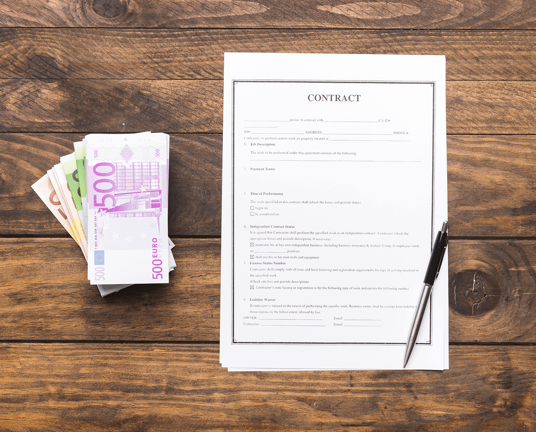 flat lay contract with money wooden table 1