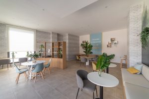 New housing development with communal swimming pool and garden areas