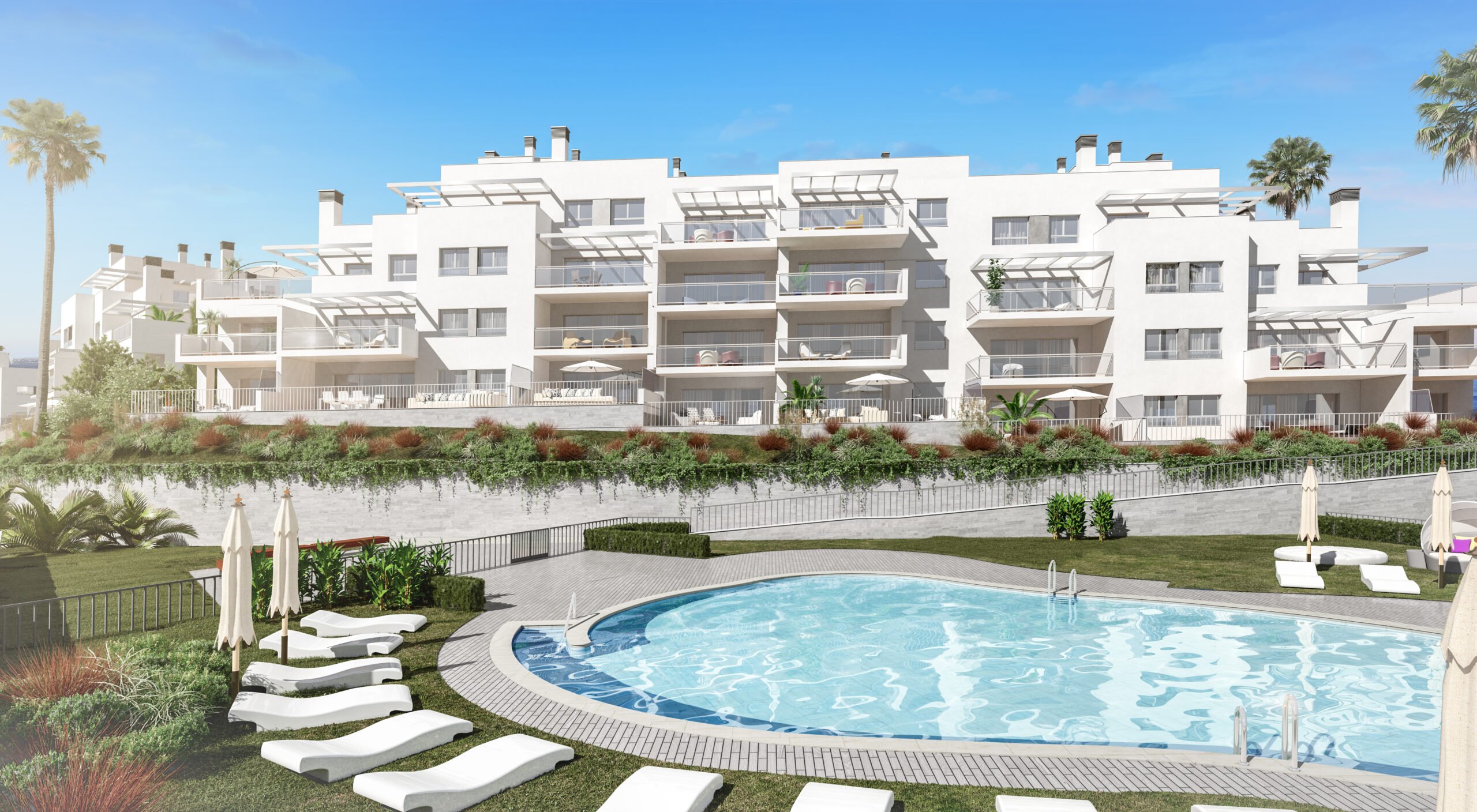 Urbanización Culmia Costa Galera III en Almuñécar con edificios de color blanco, terrazas amplias, piscina comunitaria y zonas ajardinadas